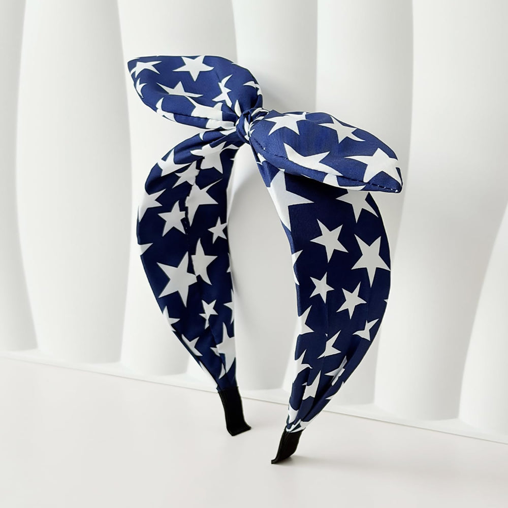 Generic brand front view of blue bow headband showing festive look and fit