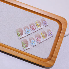 Generic close-up of 3D flower detail on acrylic nails highlighting design