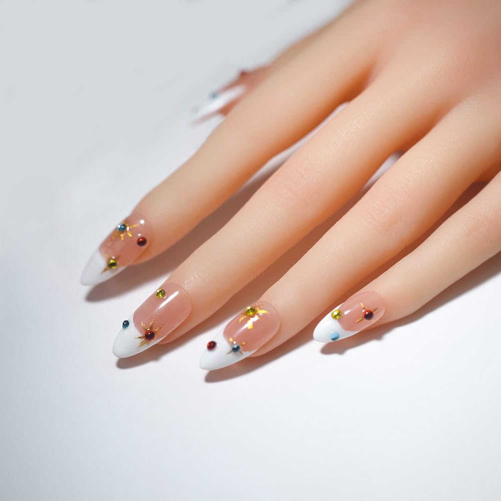 Generic close-up of gold starburst detail on nail, adding delicate shimmer and focal interest