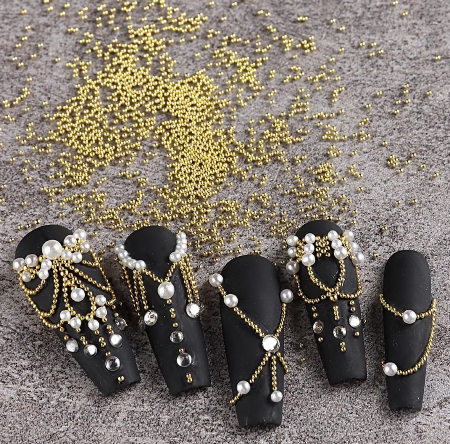 Generic manicure with gold beads demonstrating decorative 3D accent