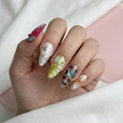 Generic hands applying a press-on nail demonstrating easy at-home application