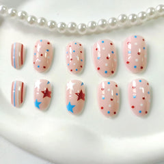 Generic hands wearing the press-on nails at a barbecue showing easy party-ready benefit