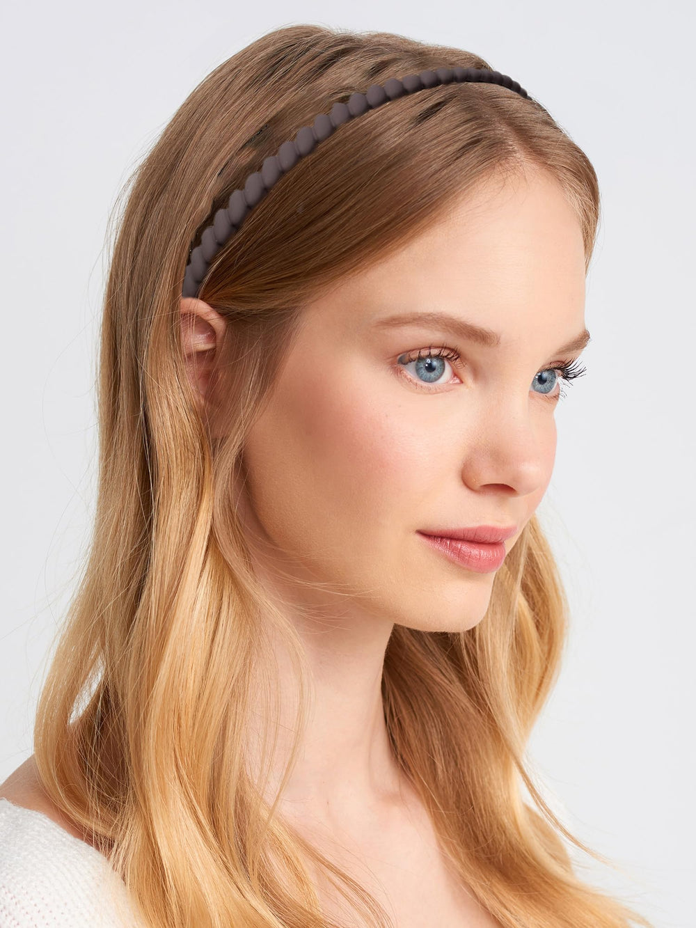 Generic brand four neutral color headbands displayed together for outfit matching