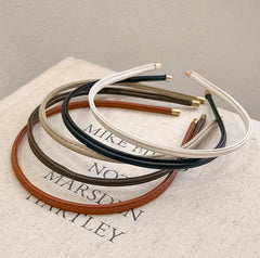 Generic headbands lifestyle on desk beside outfit showing effortless accessorizing and versatility
