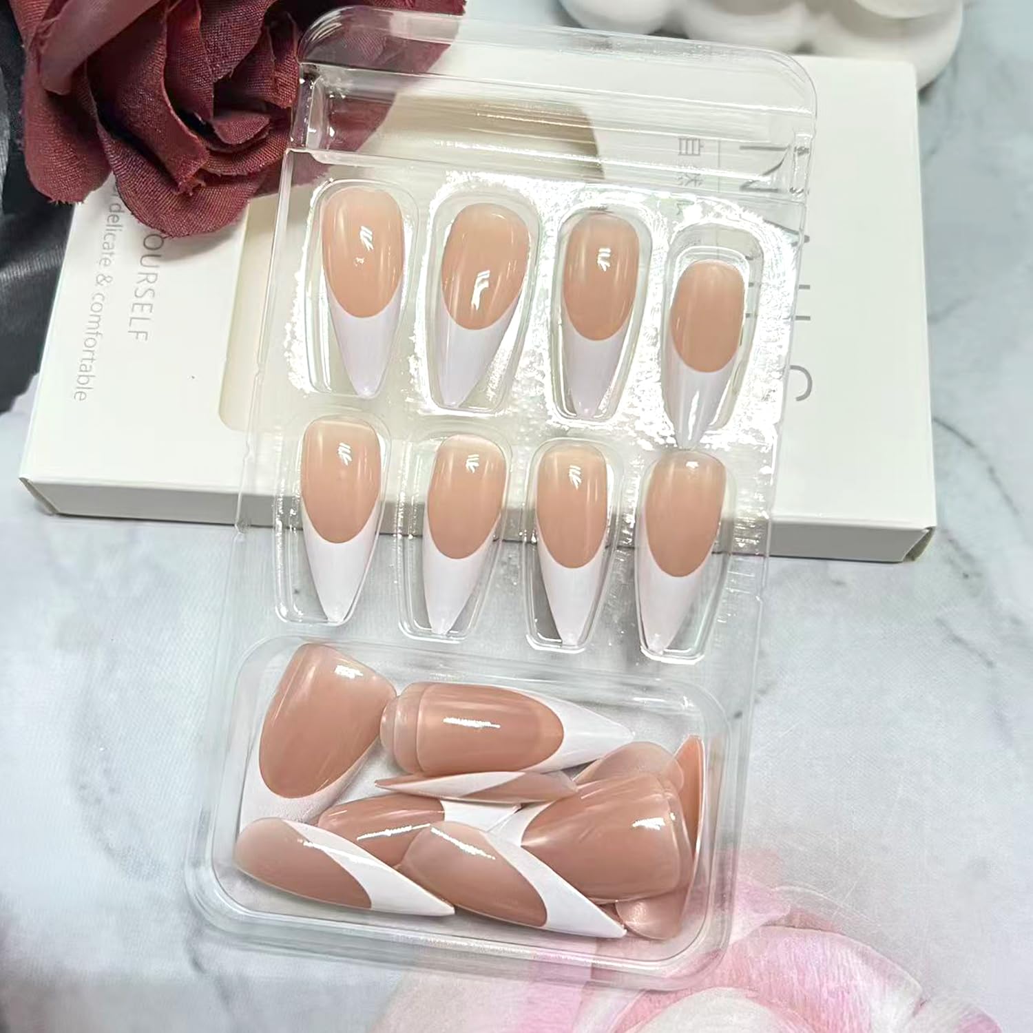 Generic brand nails worn on hand illustrating extra-long almond shape and instant style upgrade