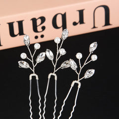 Generic bride and bridesmaids wearing pins for cohesive formal hairstyle accents