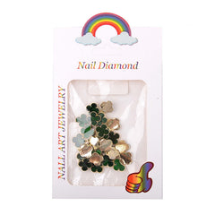 Generic lifestyle St. Patrick's Day manicure with clover charms showing festive polished look