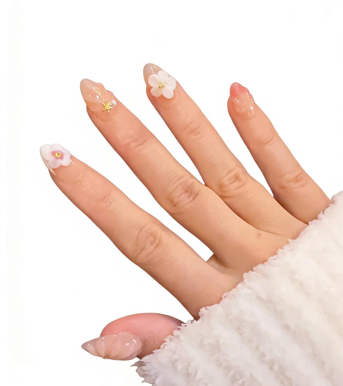 Generic close-up of 3D flowers and pearls on nail showing intricate detail benefit