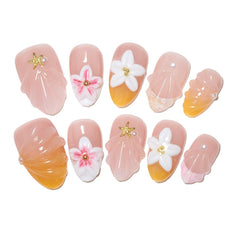 Generic press-on nails front packaging showing contents and beach design benefit: easy at-home manicure