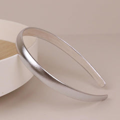Generic silver headband front view showing sleek satin finish and polished look