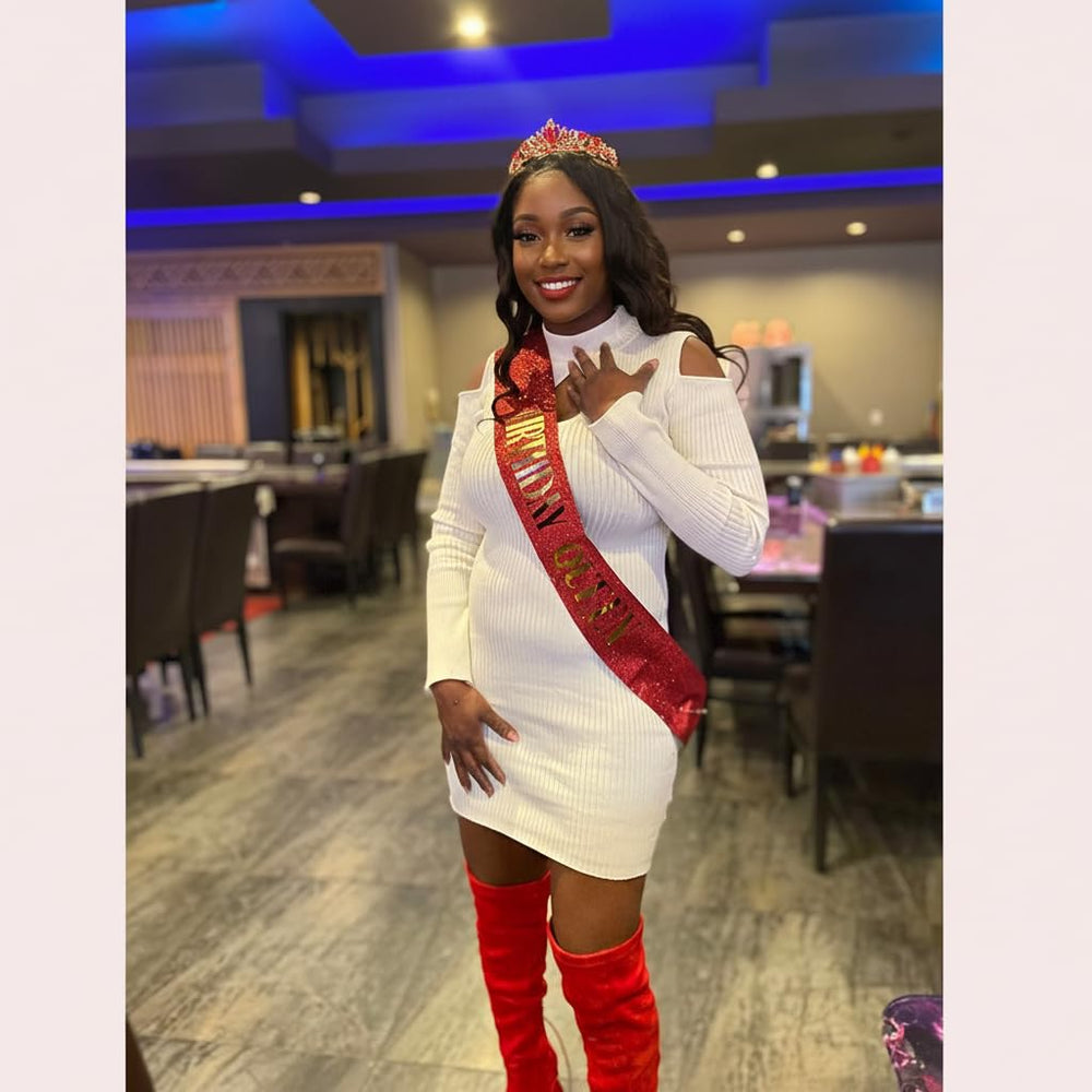 Generic model wearing tiara and sash at party showing celebratory look and photo-ready style