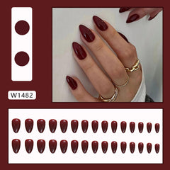 Generic brand close-up glossy surface detail of wine red nail, smooth shine and polish preserved