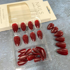 Generic brand nails in hand for scale, demonstrates medium almond length and wearable size