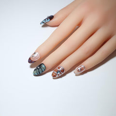 Generic worn nails on hand lifestyle shot, demonstrating natural almond shape and everyday wear