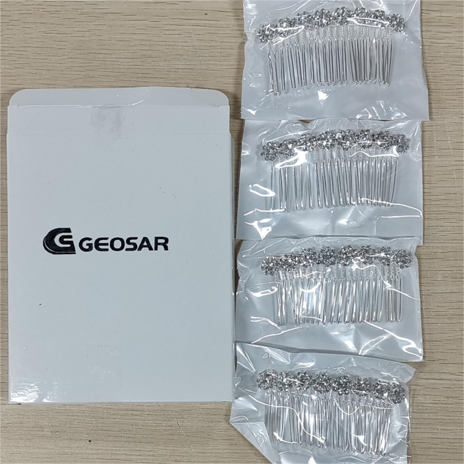 Geosar comb in bridal mirror ready scene conveys polished look