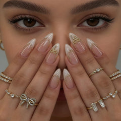 geyakal close-up of 3D gold bow detail adds elegant focal point