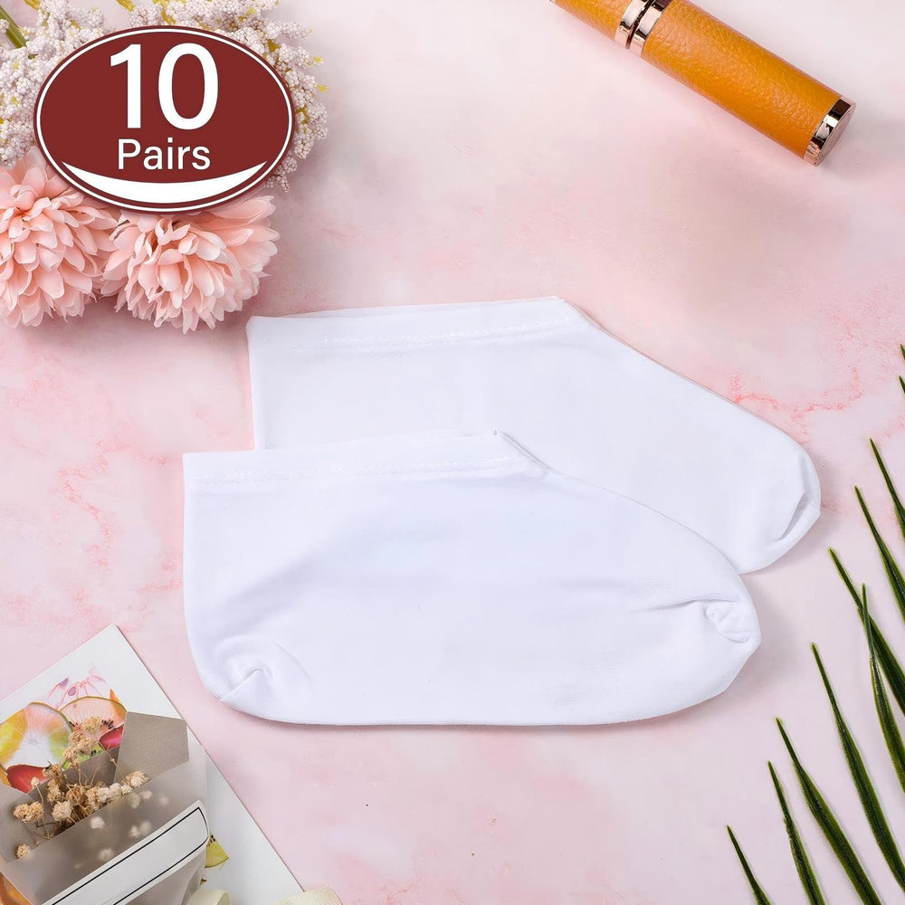 Geyoga socks folded in hands demonstrating compact portable size