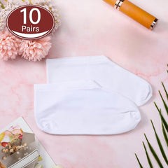 Geyoga socks folded in hands demonstrating compact portable size