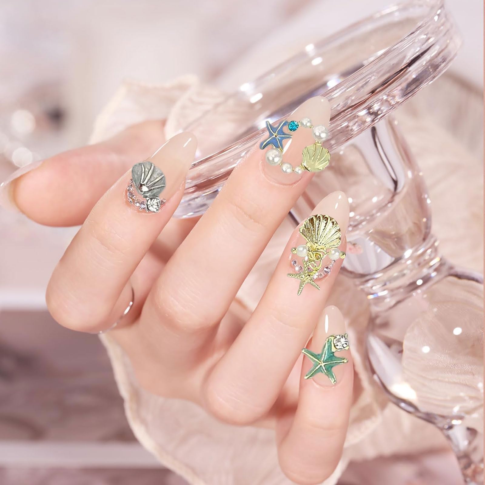 Gieehiol charms on nail tips demo illustrating application and visual impact