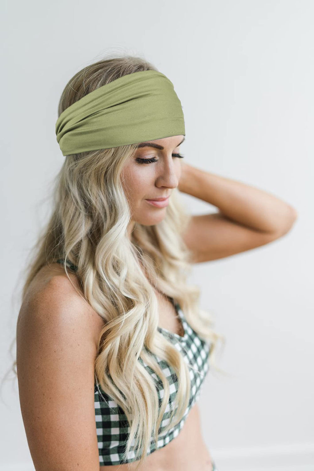 GiLi headband worn during yoga demonstrating non-slip fit and sweat control