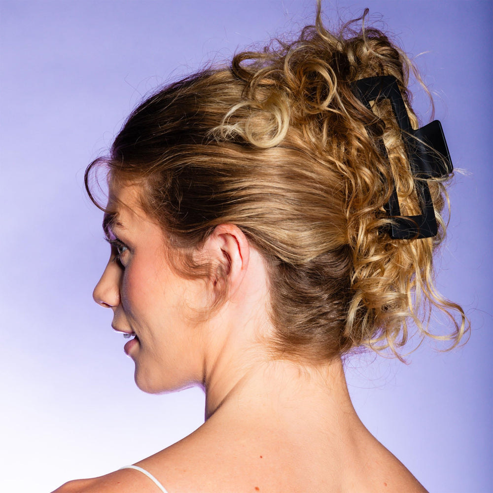 GIMME clip beside ruler showing extra-long size for large hair bundles
