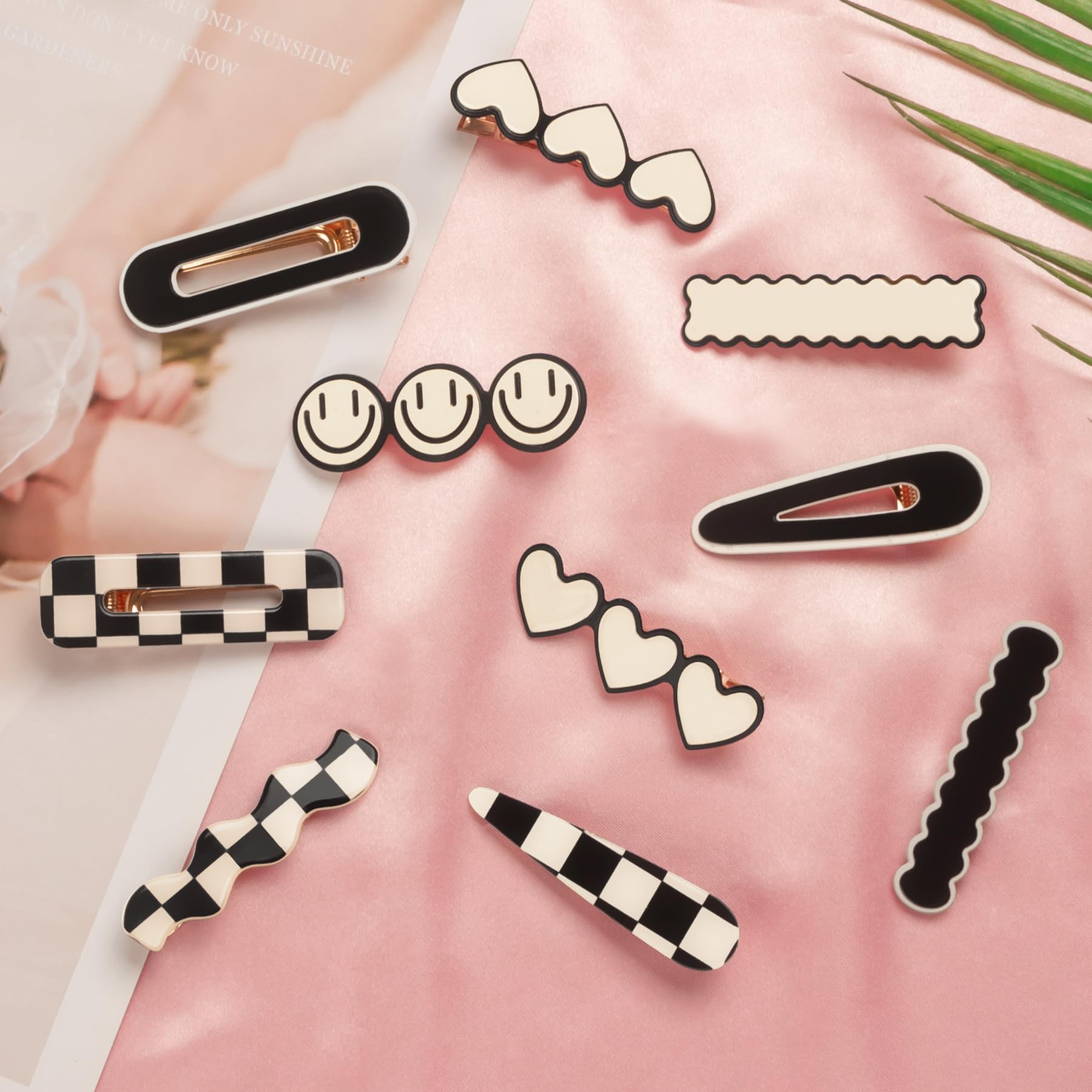 Gingbiss clips beside purse and outfit in lifestyle scene, showing travel-ready fashion accessory benefit