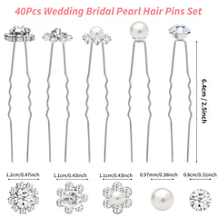 Gingbiss pins arranged on neutral fabric displaying variety of five designs for styling inspiration