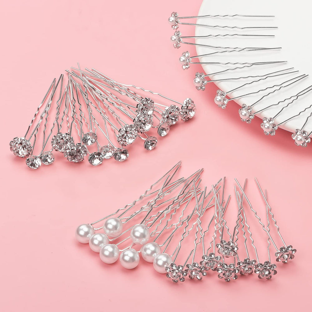 Gingbiss pins beside a ruler to show 2.75 inch length and precise sizing for hairstyling