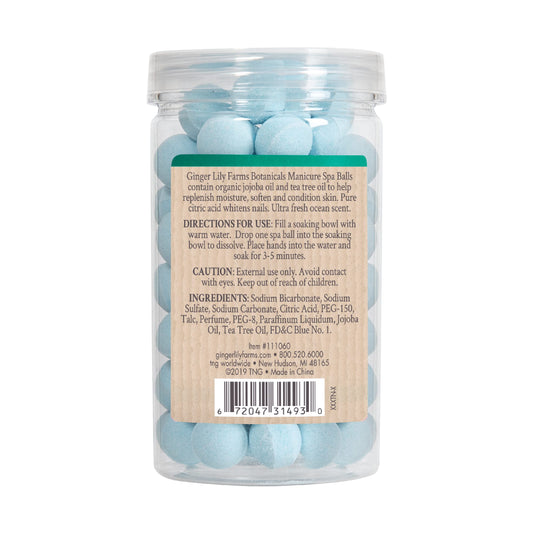 Ginger Lily Farms spa ball dissolving in a manicure bowl for easy use