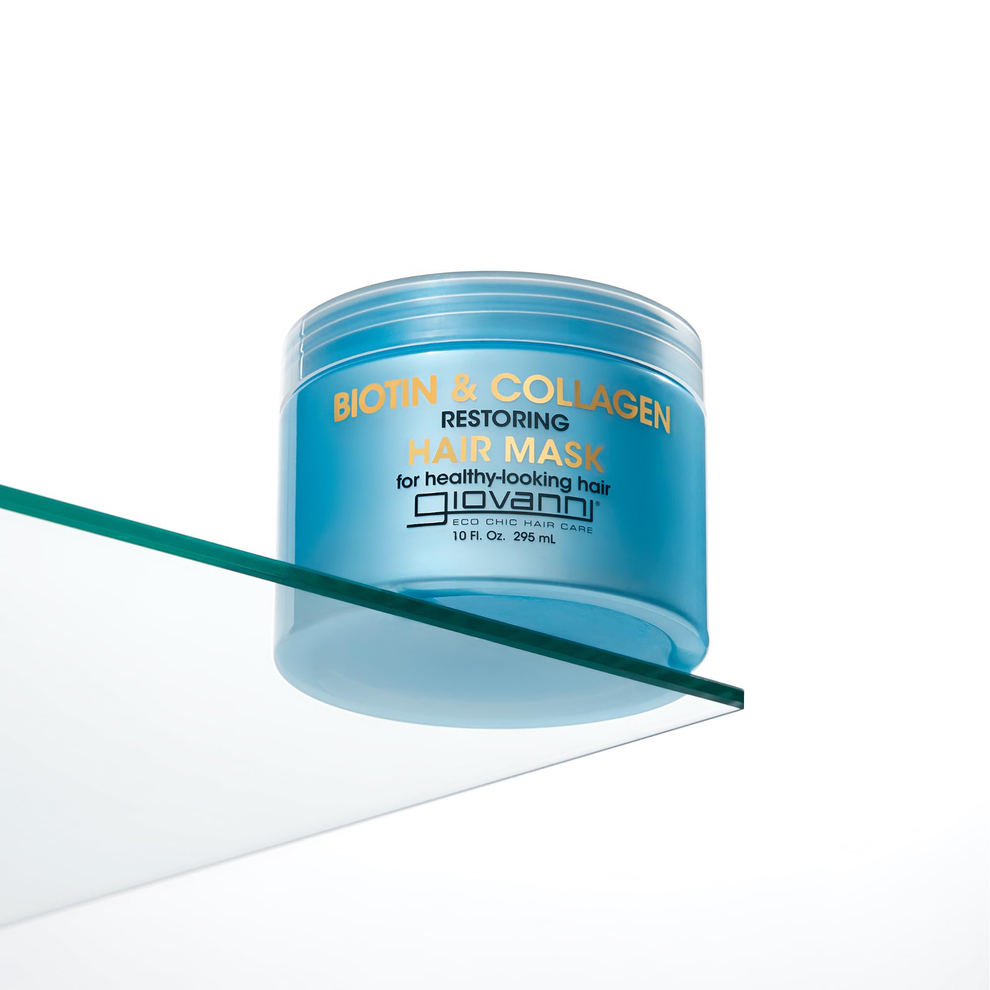 GIOVANNI applying mask to curly hair to detangle and boost curl definition
