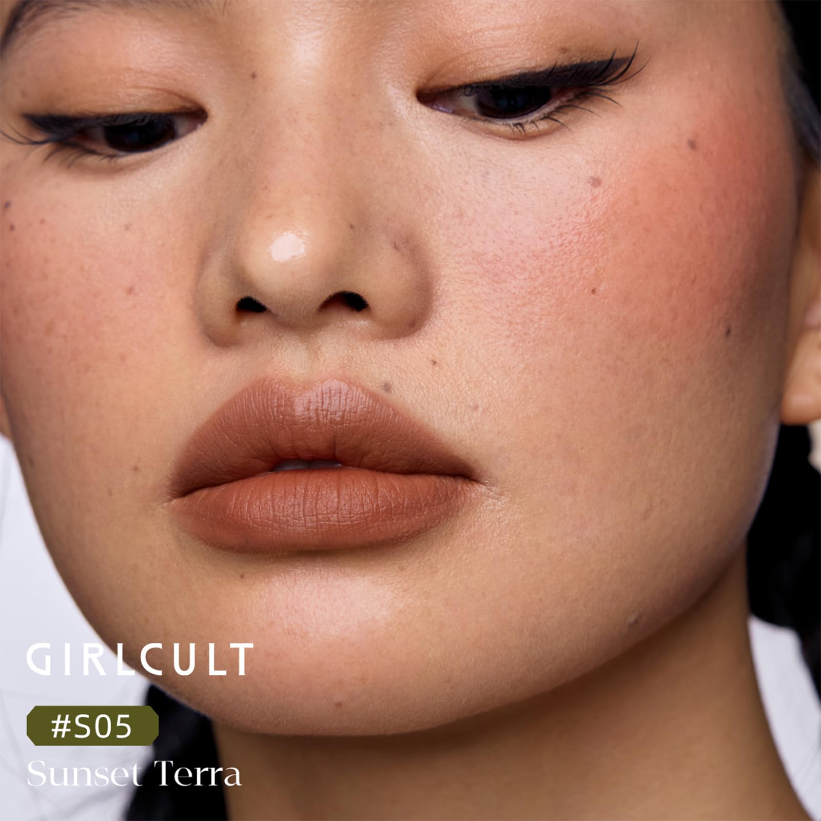 GIRLCULT lipstick texture swatch on paper showing matte pigment and buildable color
