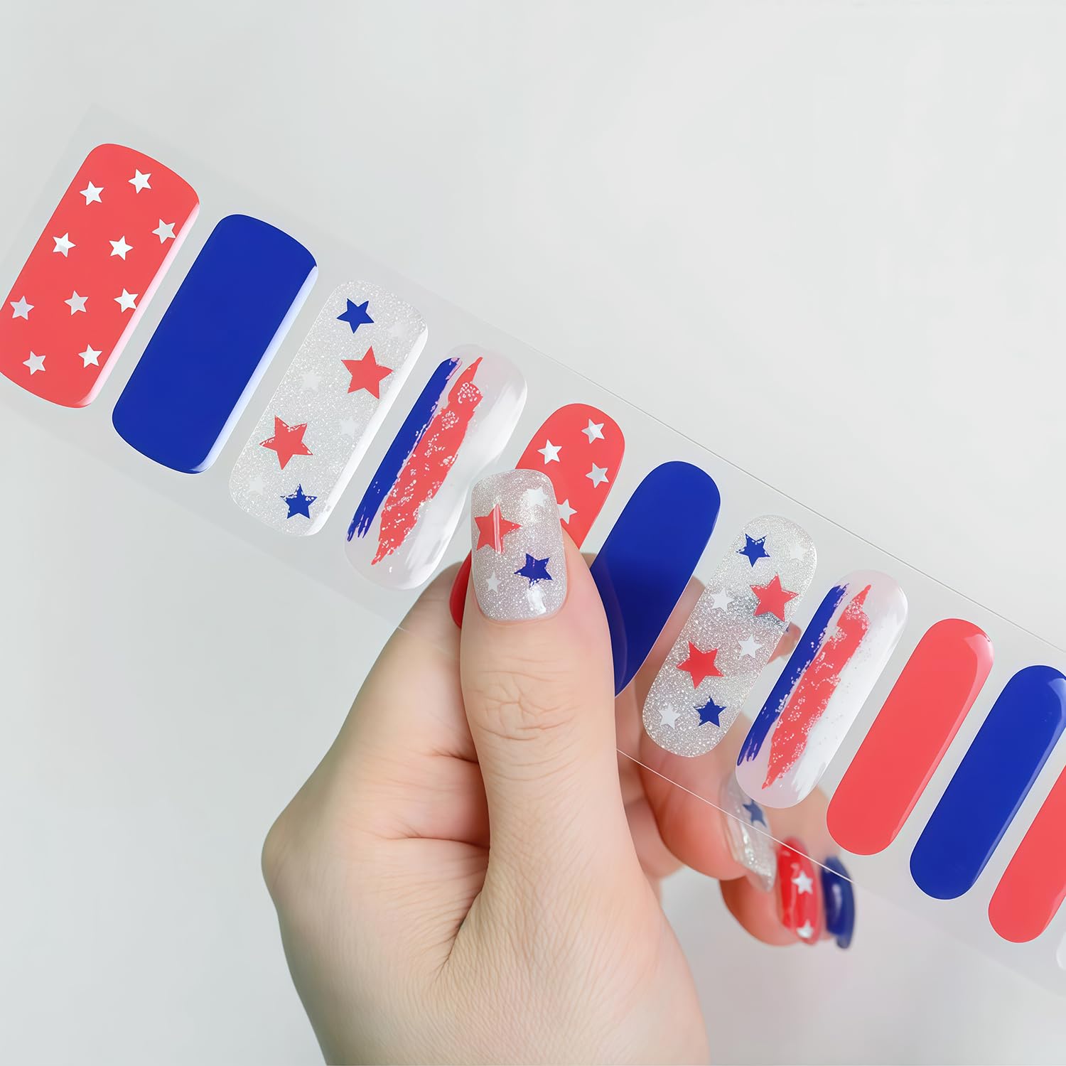 GJJBQTT hand peeling a sticker for easy at-home application