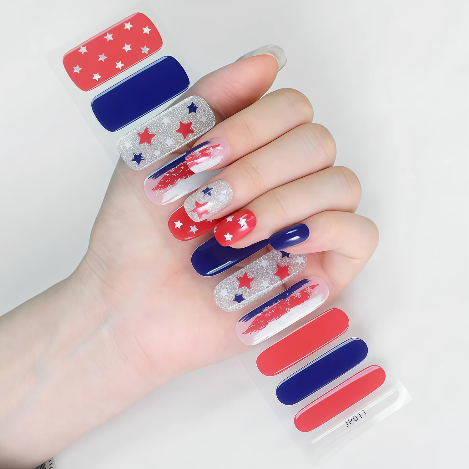 GJJBQTT nail strip curing under UV lamp demonstrating glossy finish and durable wear benefit