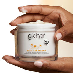 GK HAIR applied to damp hair to show nourishing coverage and repair