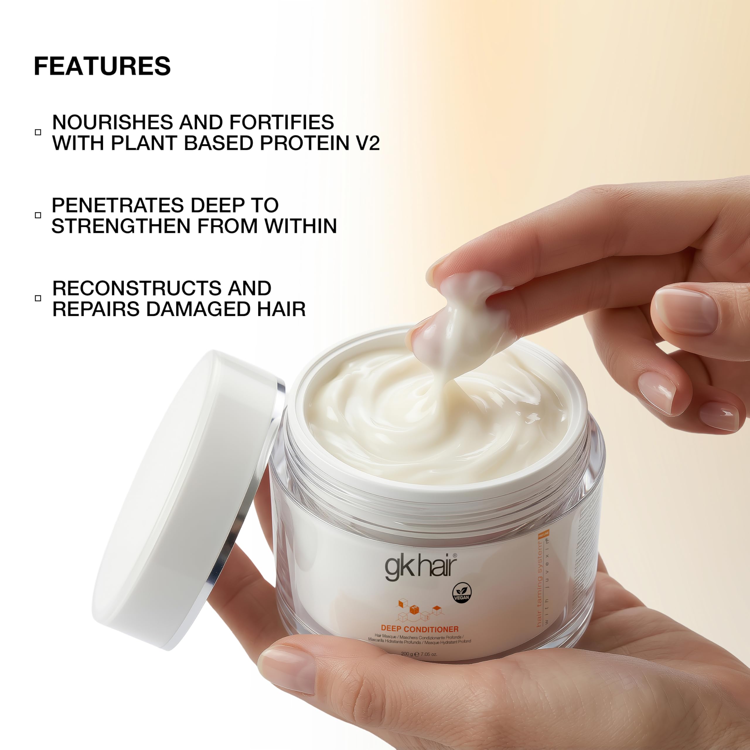 GK HAIR ingredients display with jojoba oil and grain extracts for hydration