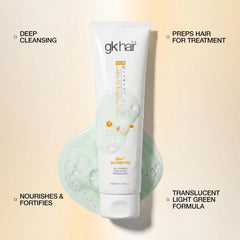 GK HAIR bottle in hands for size scale and convenient travel benefit