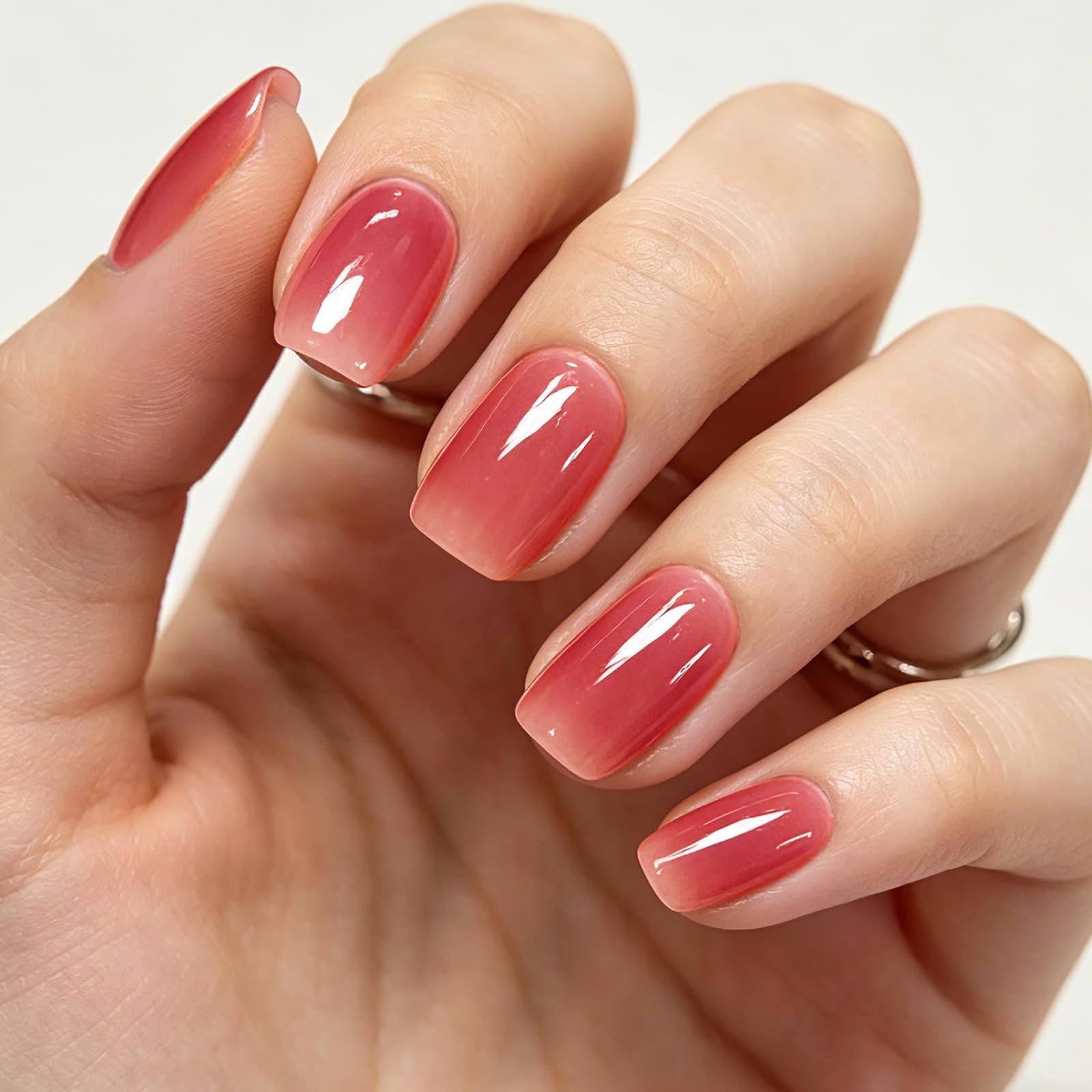 GLAMERMAID hand model wearing deep rose squoval nails illustrating a polished everyday look