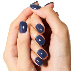 GLAMERMAID nails held in hand for scale showing comfortable short length benefit