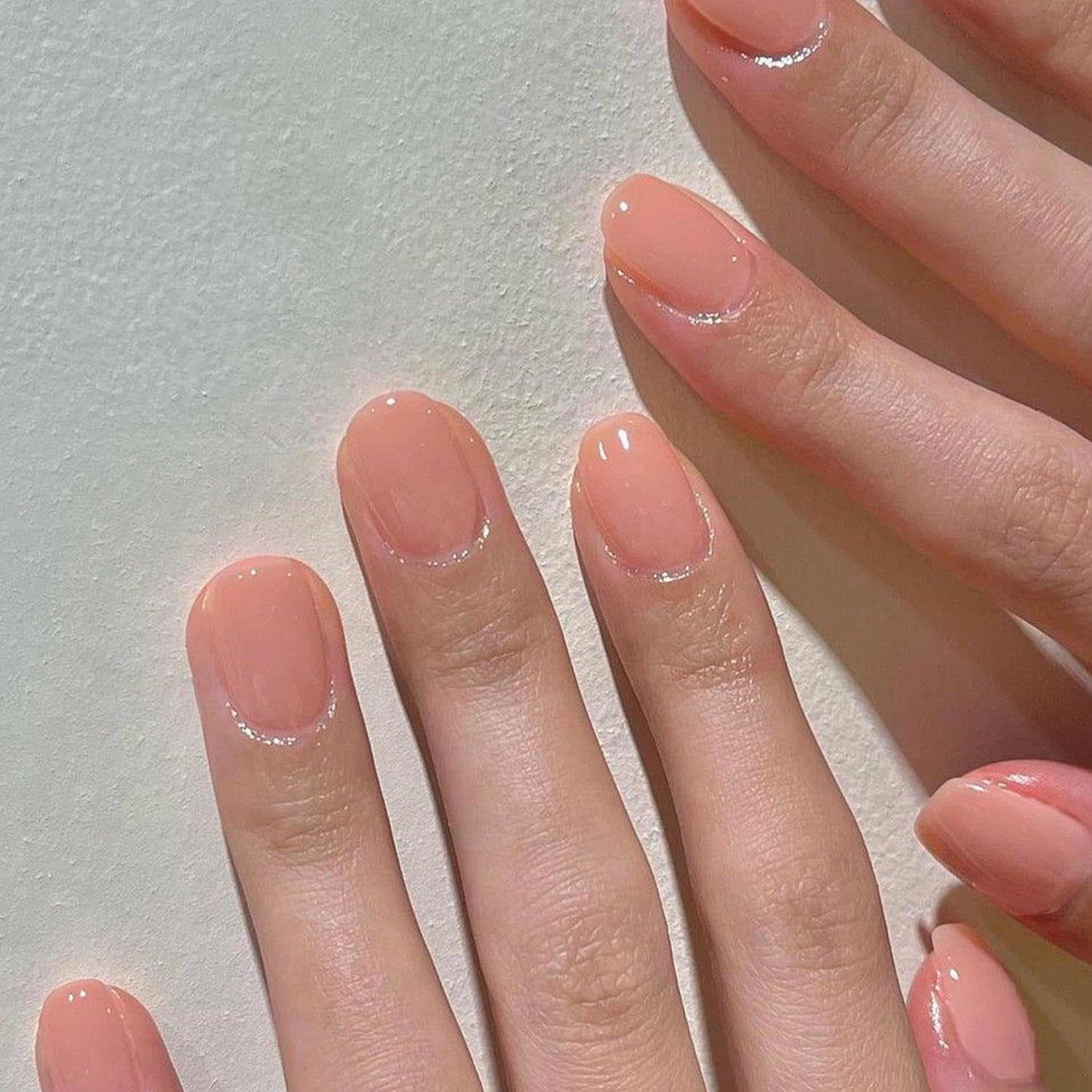 GLAMERMAID nails applied on hand demonstrating neat short square look