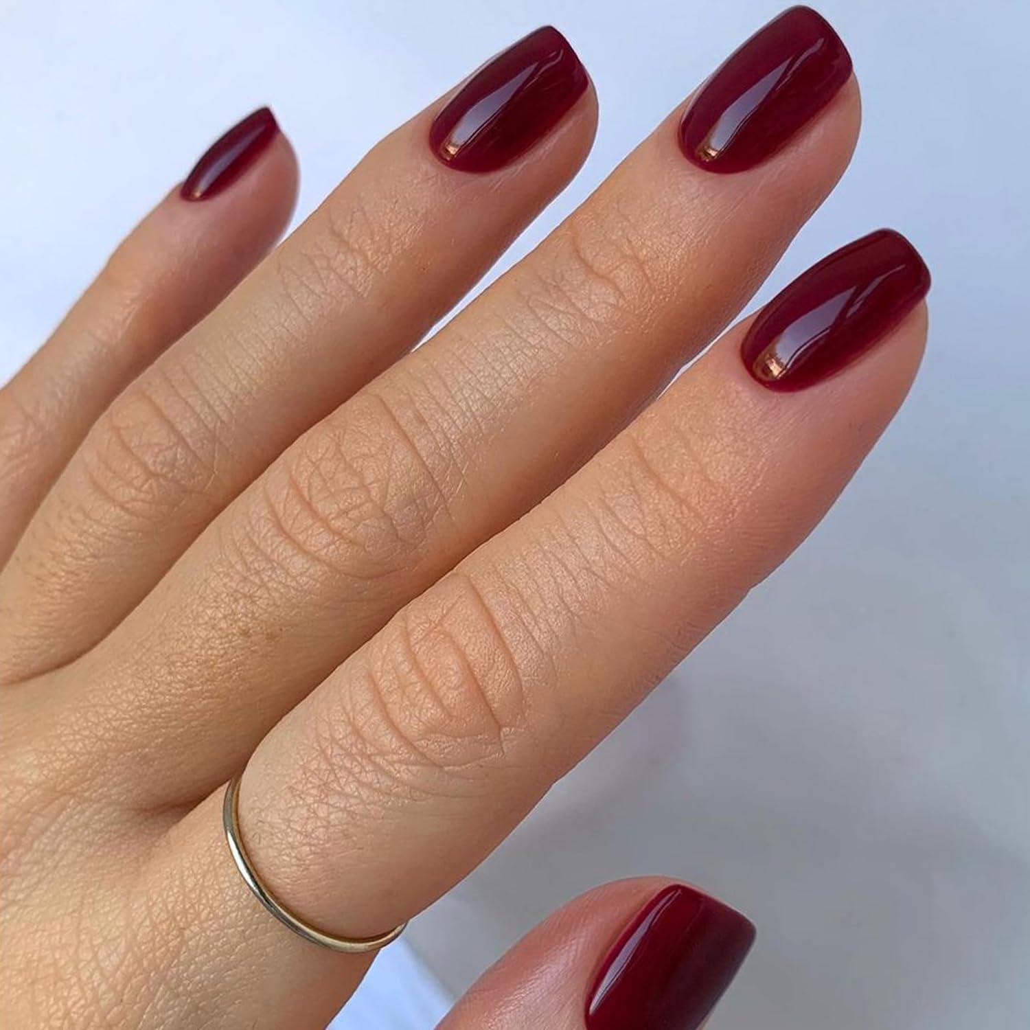 GLAMERMAID demo on thumb and index showing natural short-square fit
