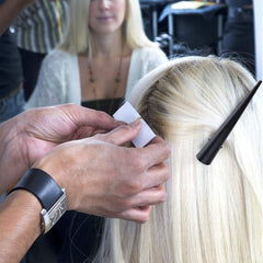 GLAMFIELDS clip holding thick hair demonstrating strong clamp benefit