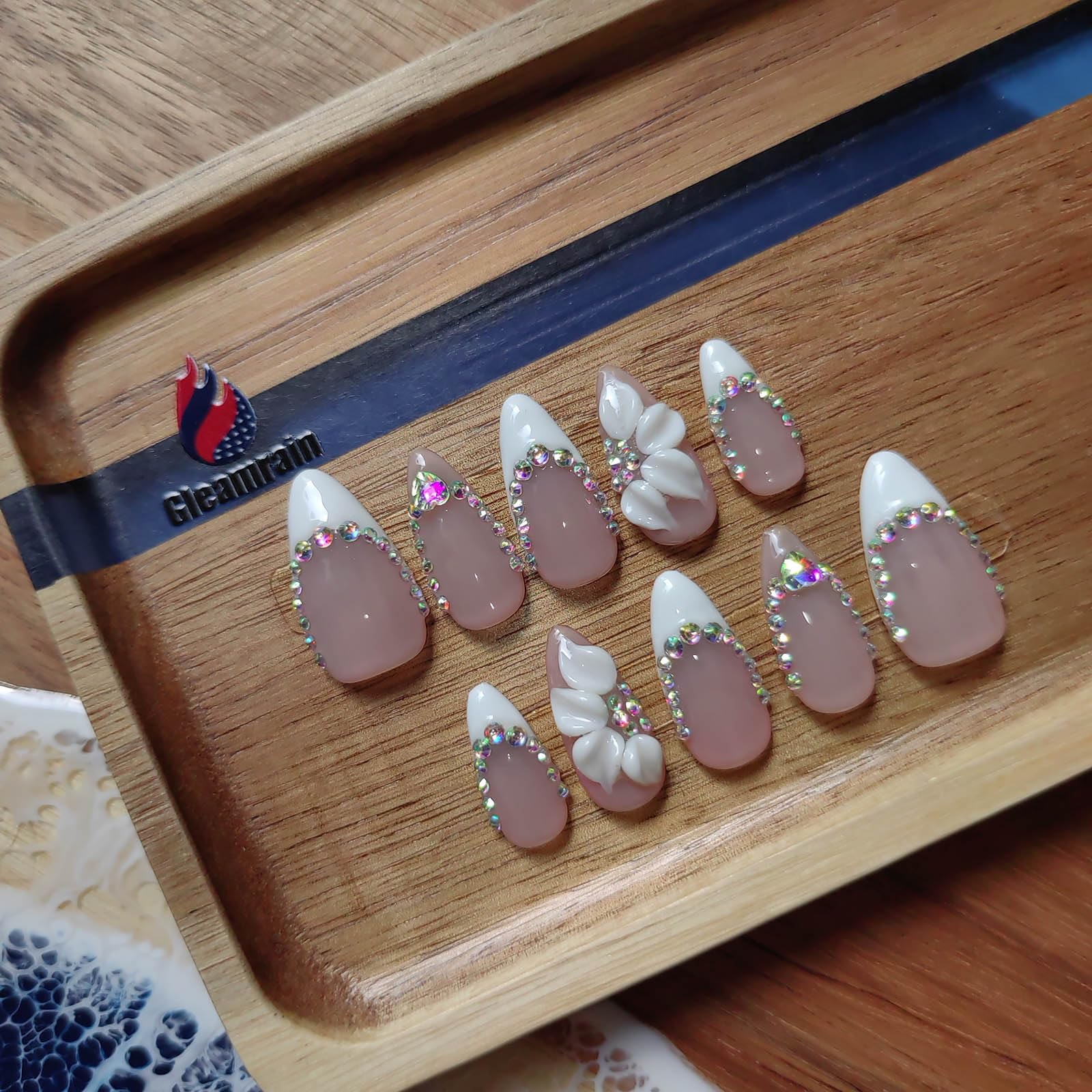 Gleamrain front packaging showing ten almond nails and benefit of ready-to-wear elegance