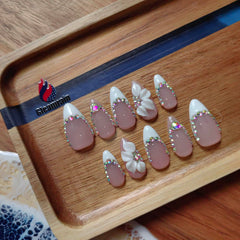 Gleamrain front packaging showing ten almond nails and benefit of ready-to-wear elegance
