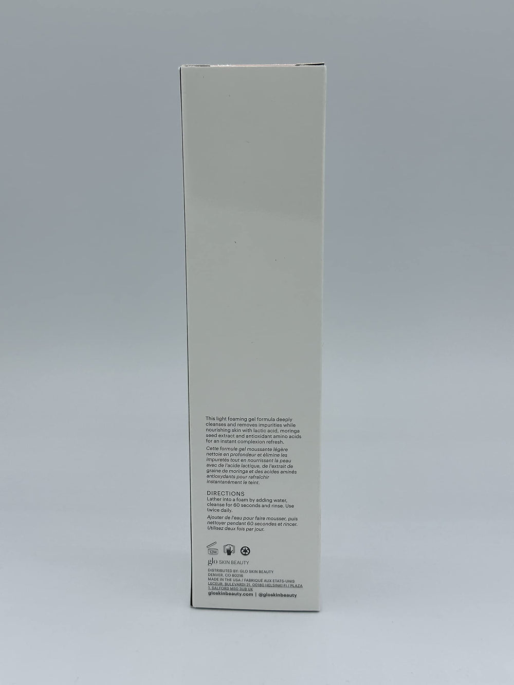 Glo Skin Beauty bottle styled on bath shelf suggesting aesthetic and routine-ready benefit