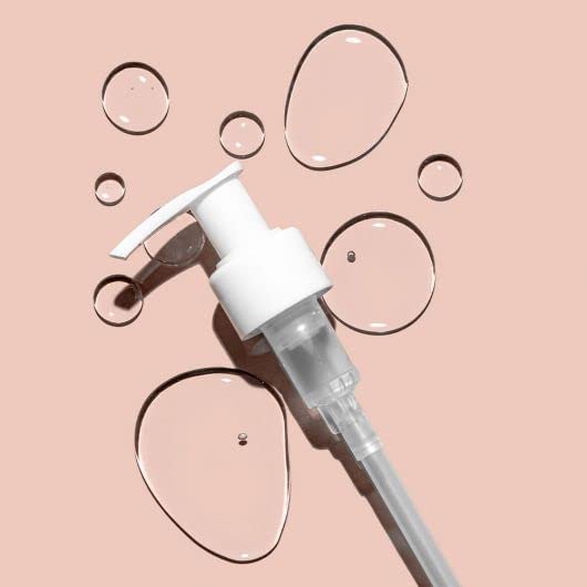 Glo Skin Beauty dispenser close-up delivering controlled pump for convenient use