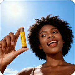 Glo Melanin in hand for size scale, portable and easy to carry