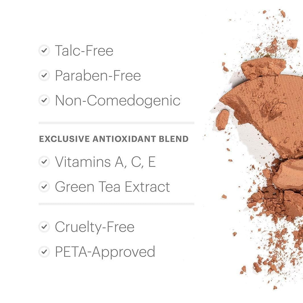 Glo Skin Beauty open compact alongside brush to demonstrate easy application and portability