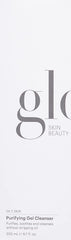 Glo Skin Beauty gel dispensed on fingertips demonstrating lightweight spreadability