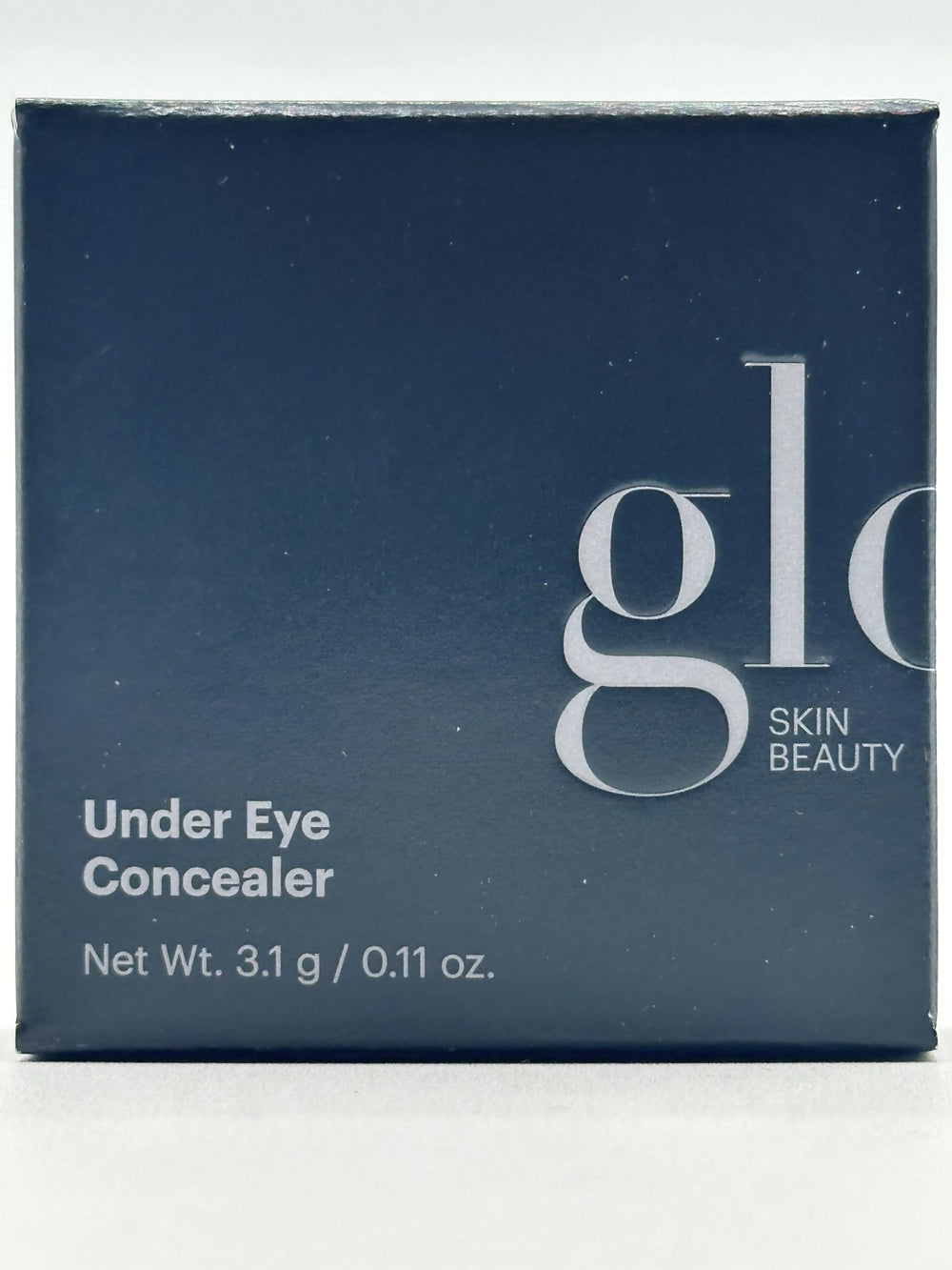 Glo Skin Beauty compact next to lipstick showing size and travel-friendly benefit