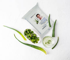 Global Beauty Care wipe in hand demonstrating size and single-use convenience